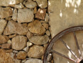 Wall and Wooden Wheel, Pianogrillo Farm Organic Winery, Chiaramonte Gulfi, Sicily